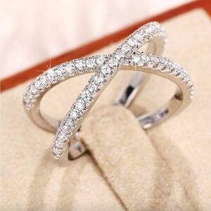Elegant Silver Crossover Ring
